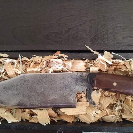 a group of shoes on a wooden surface