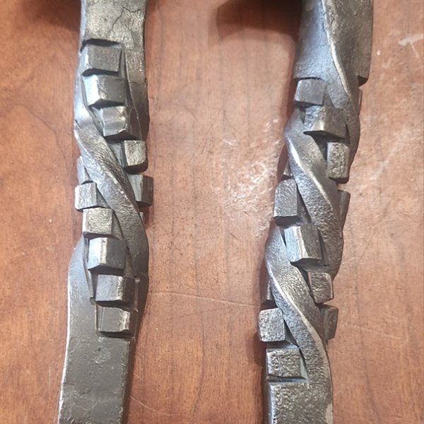 a pair of boots on a leather chair