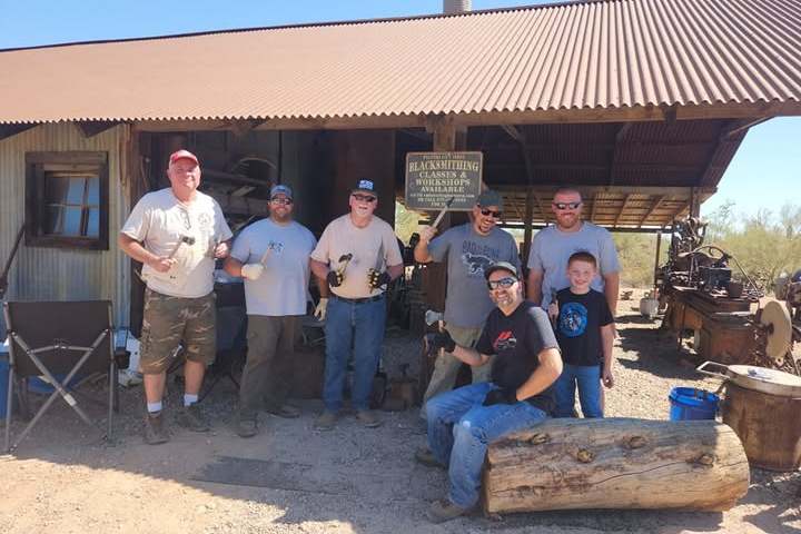 a group of people standing in front of a building