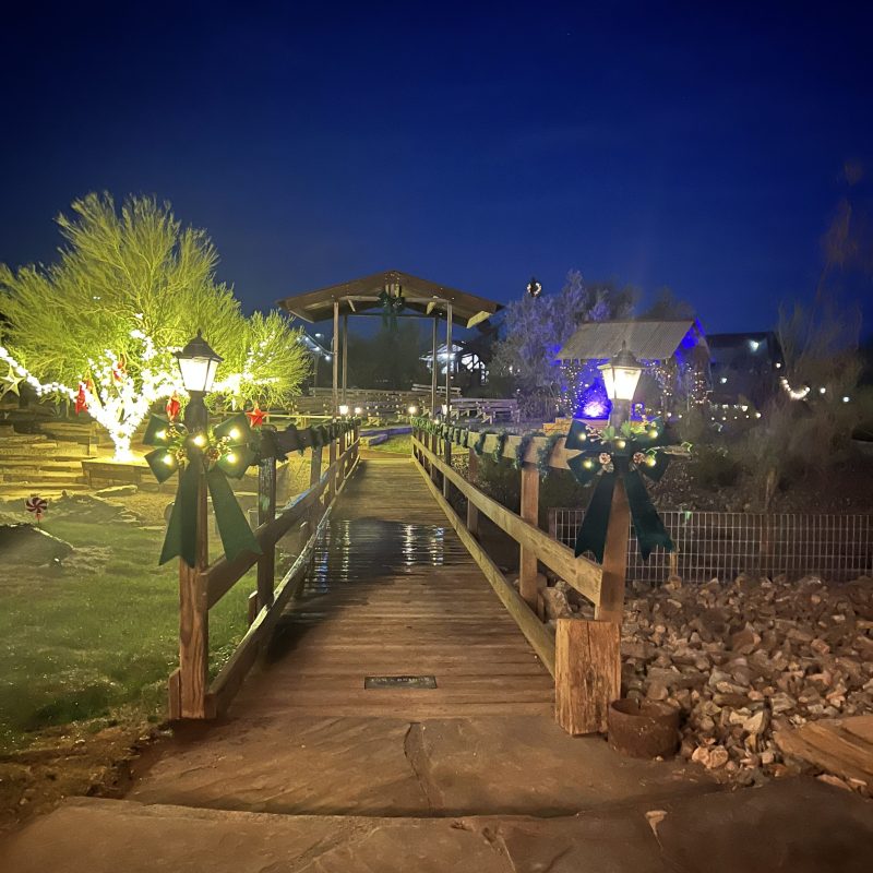 a group of people walking down the street