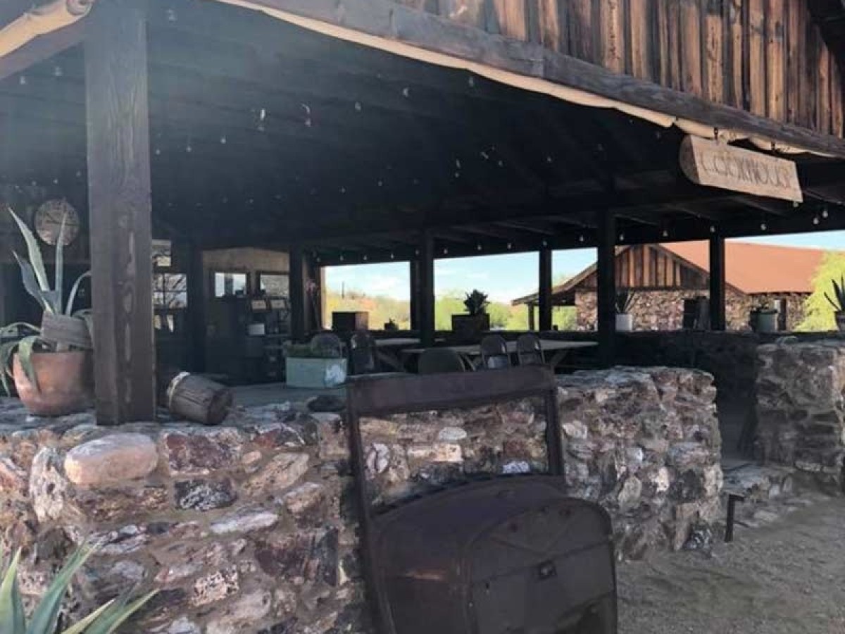 a train is parked on the side of a building