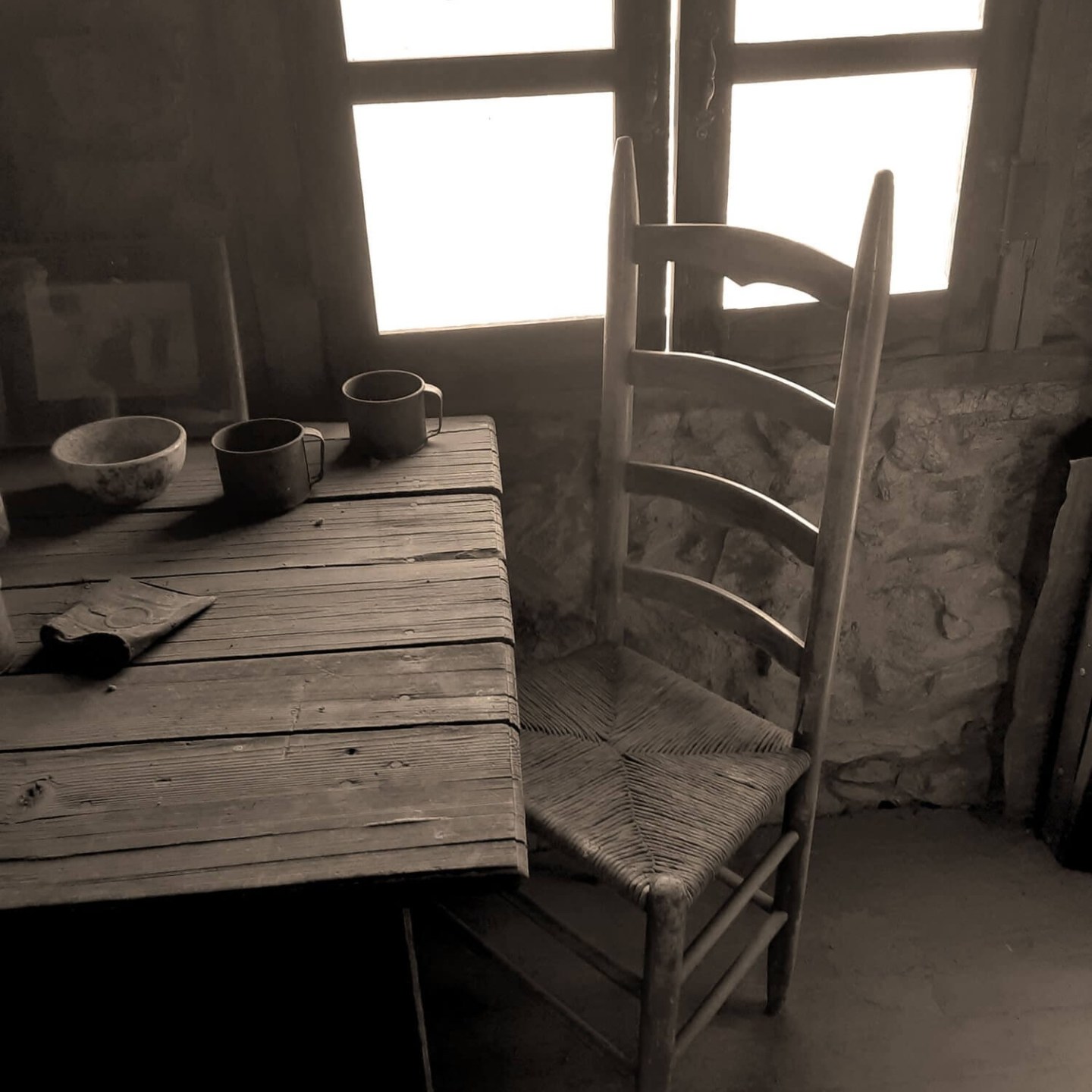 a chair sitting in front of a window