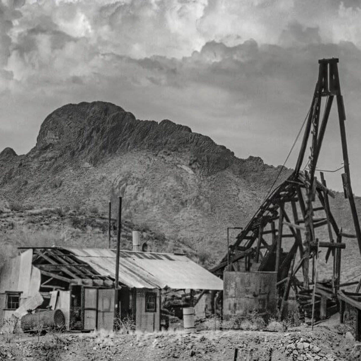 a house with a mountain in the background