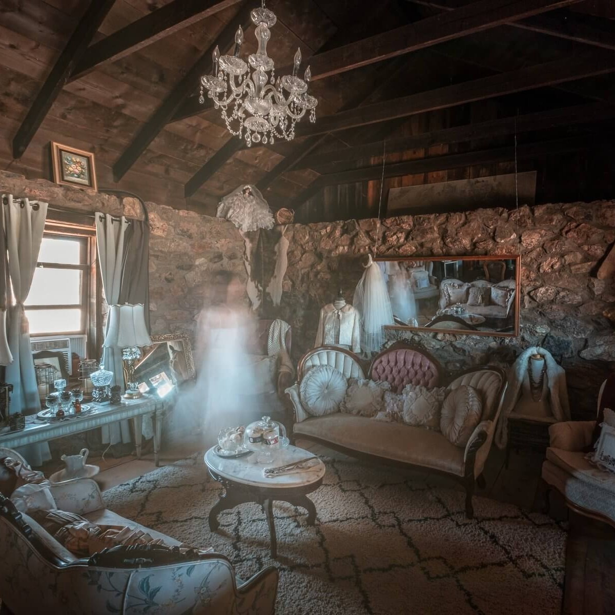 a room filled with furniture and a fireplace