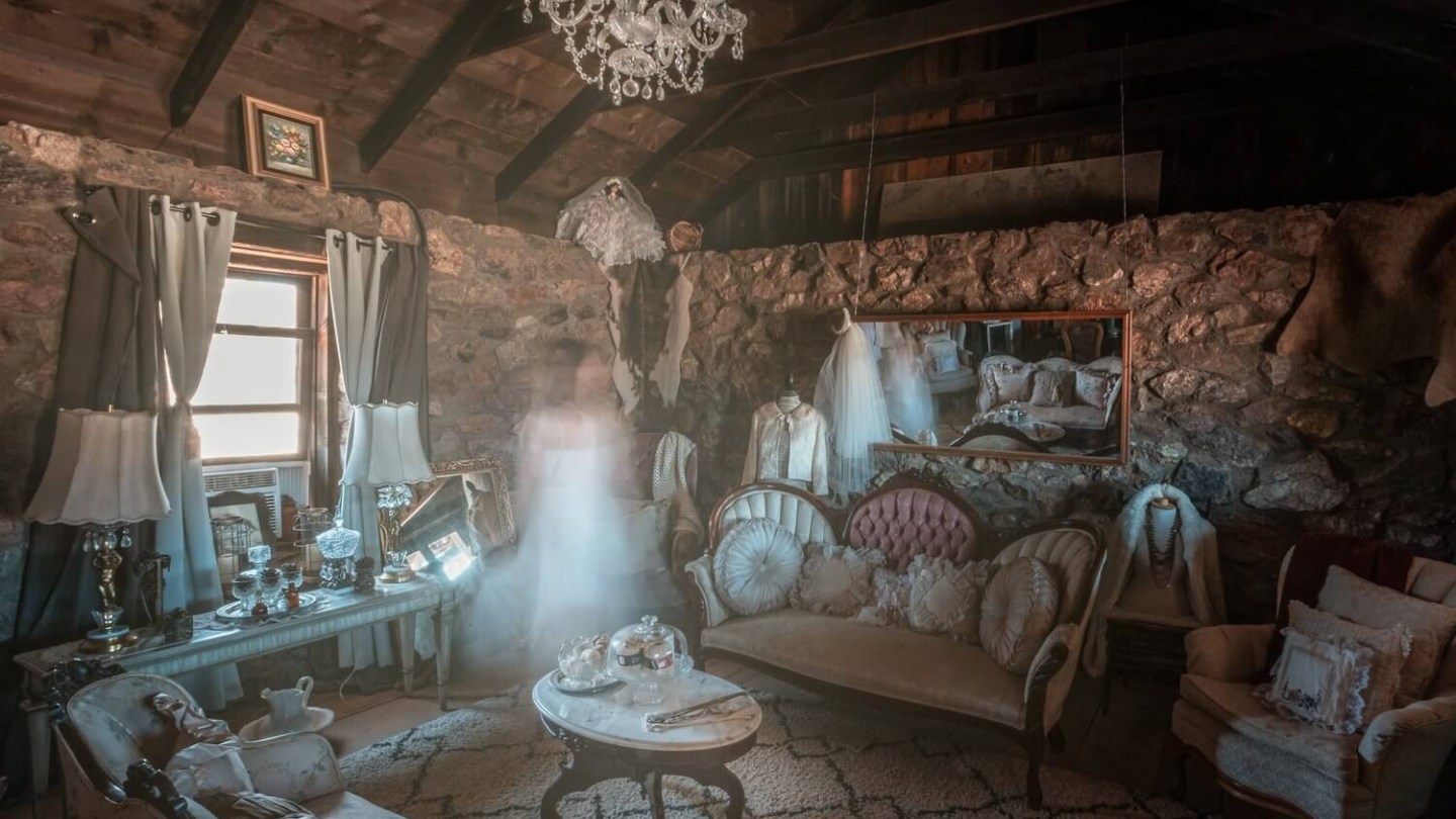 a room filled with furniture and a fireplace